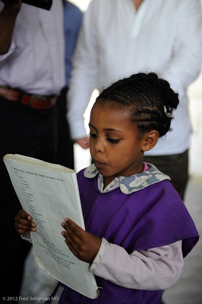 20120327_102711 Nikon D3S (1) 2x3.jpg - Reading a story in Amharic